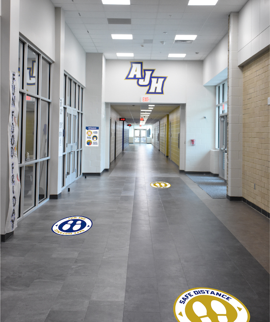 Examples of various signage for schools. Illustrations By Chelsea Lott, Graphic Designer (PBK)