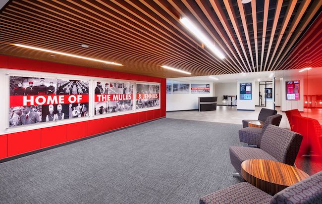 The new entrance for the University of Central Missouri's student union includes seating, a graphic timeline and a digital wayfinding kiosk. Source: KWK Architects