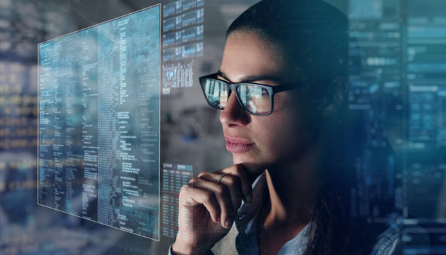 woman looking at futuristic data display